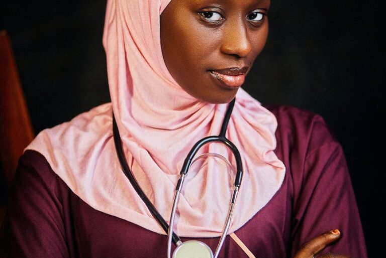 confident female doctor with stethoscope portrait